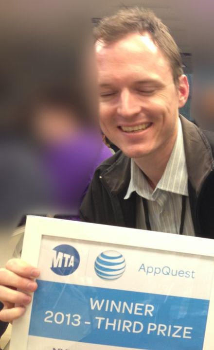 Mike Sanderson in 2013, holding the MTA and AT&T AppQuest certificate: Winner 2013, Third Prize.